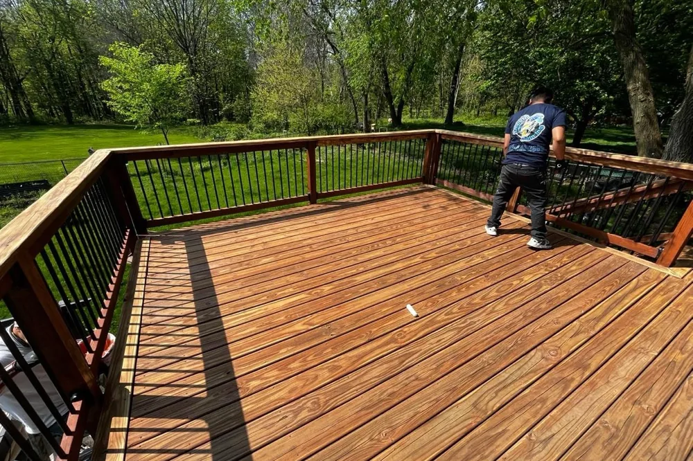 Backyard deck after semi-transparent staining by Smooth Painting