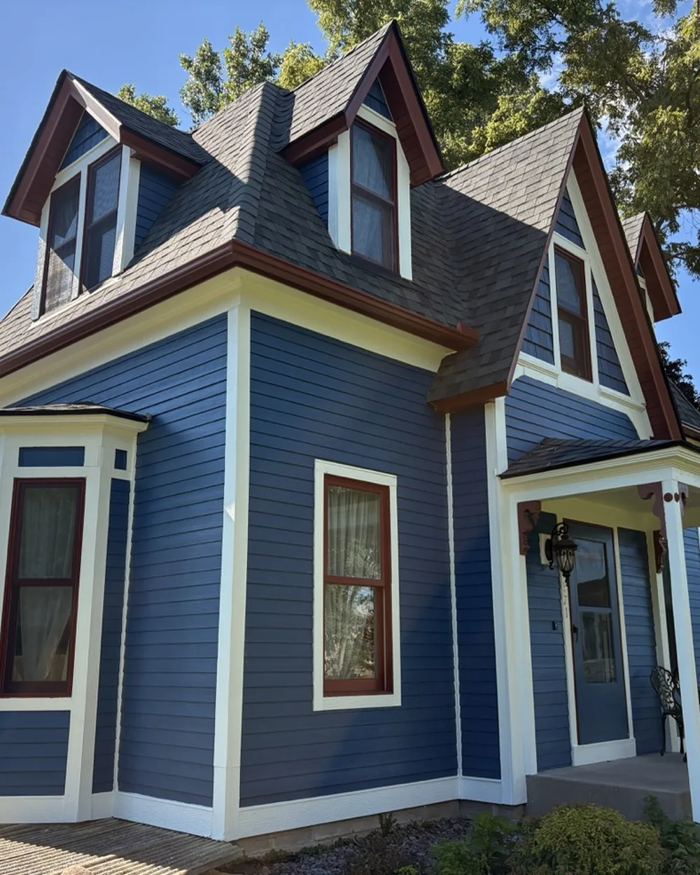 Two-story home in the east Twin Cities metro after a full exterior repaint by Smooth Painting
